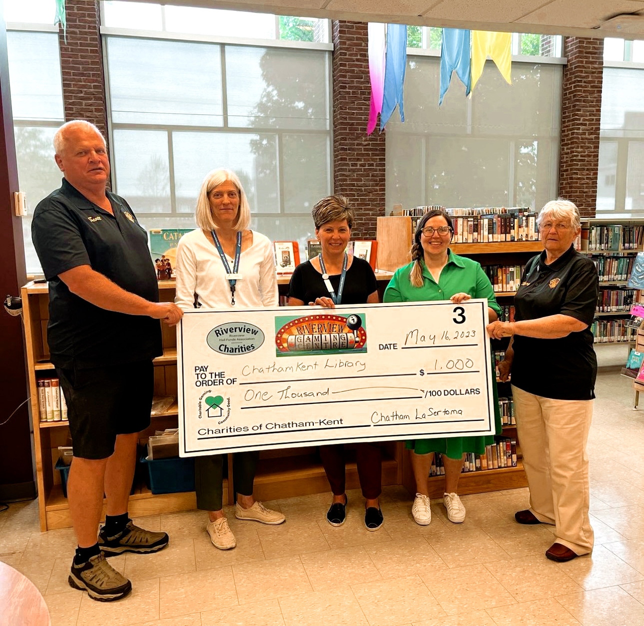Our friends from the Chatham Setroma Club holding their cheque with all the money that was raised through charitable gaming. 