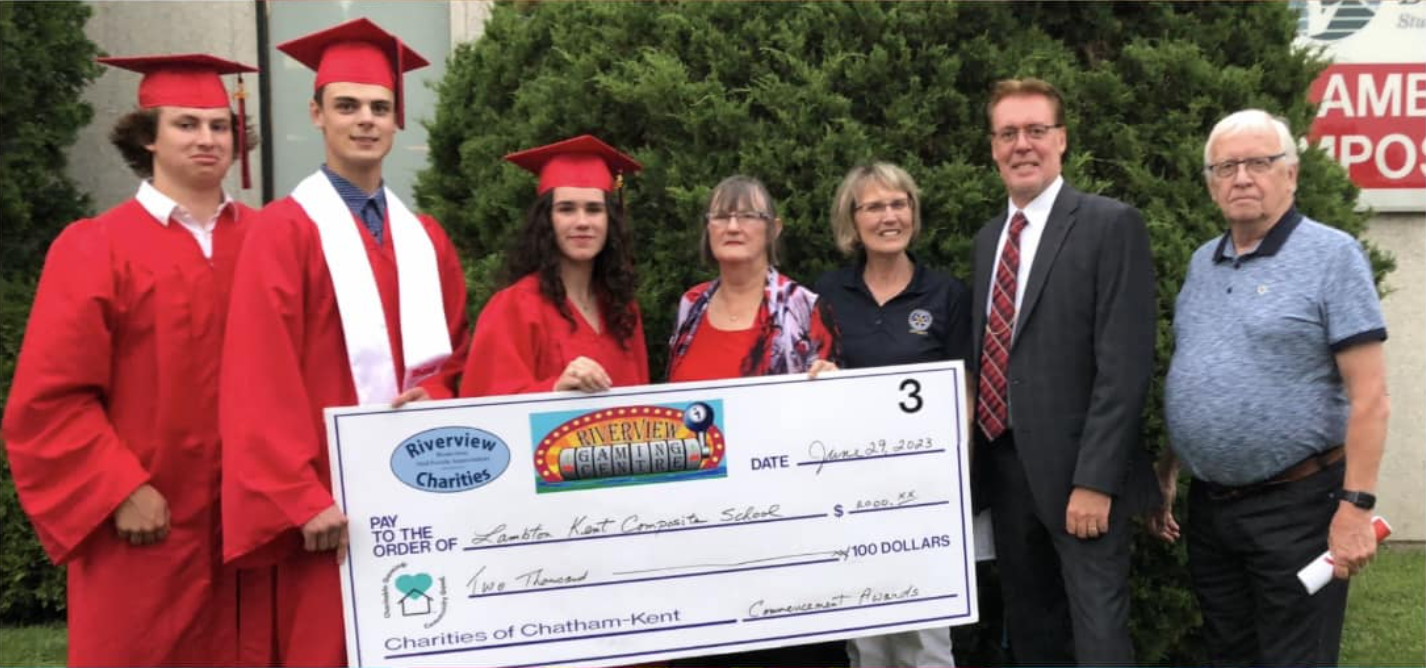 Our friends from the Dresden Rotary Club holding their cheque with all the money that was raised through charitable gaming. 